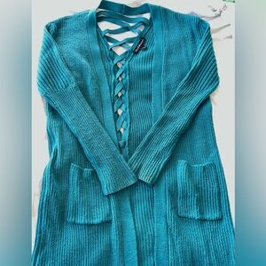 Long cardigan sweater with braided design back